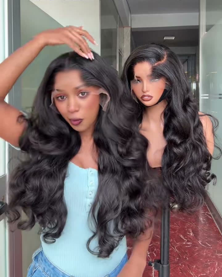 Model wearing a long black body wave wig beside a matching unit on a mannequin